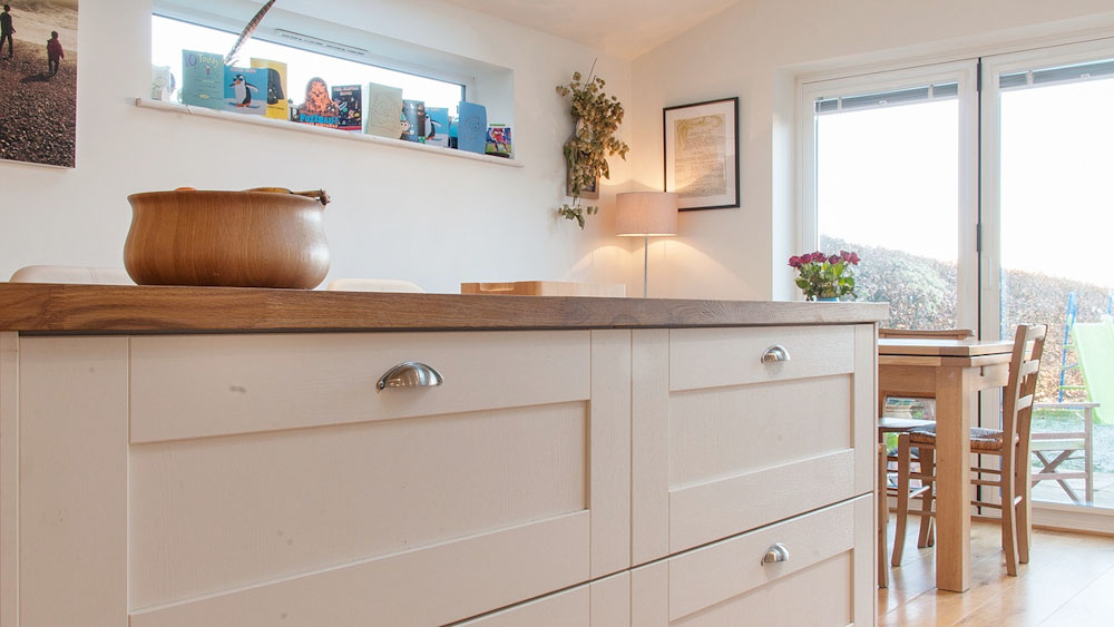 white shaker kitchen island close up Black Rok Kitchen Design Uckfield Sussex white shaker kitchen island close up
